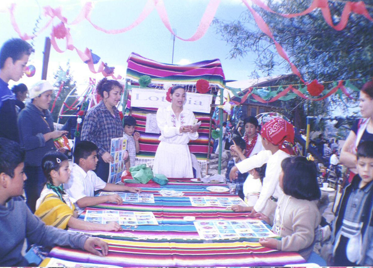Colegio La Esperanza students and guests play Loteria at 2003 Kermesse